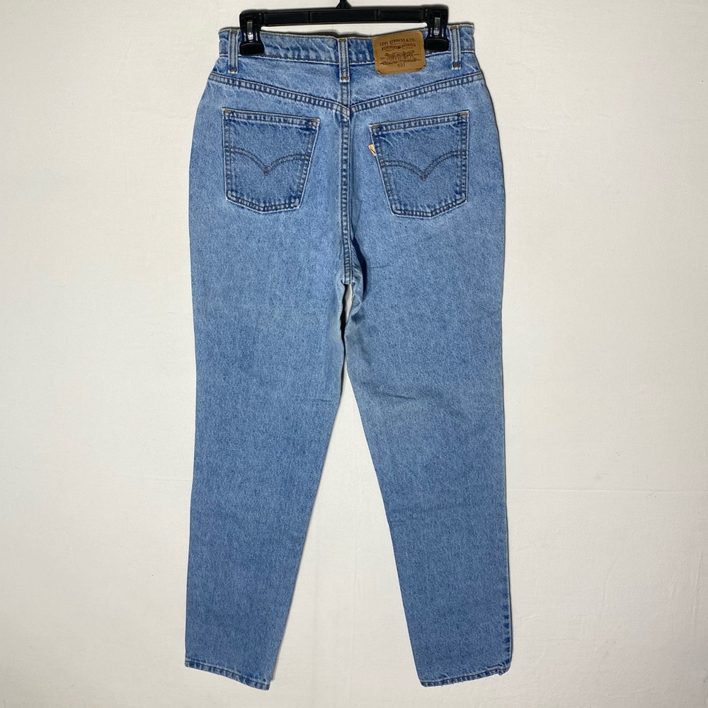 Vintage Levi’s White Tag Orange Writing 596 Light Wash High Rise Straight Leg 28
